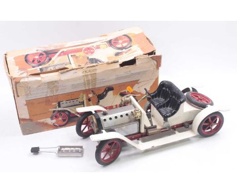 Mamod SA1 steam roadster, comprising a white and red body, housed in the original box with wear to the model and the box 