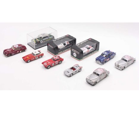 A small collection of Modern issue diecast and kit-built model cars to include two Ixo Carrera II Jaguar VII RN47, a Brumm Ja