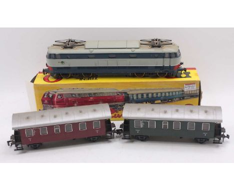 A collection of commercially made continental 0 gauge to include a Rivarossi E444 loco, in grey and blue livery, some crackin