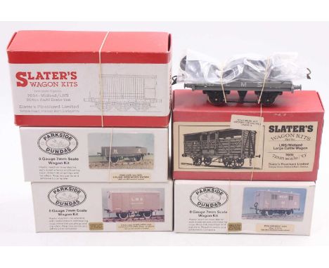 Two un-assembled kits and three assembled and one Hornby goods wagon consisting of: kit for Slater’s LMS Midland large cattle