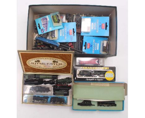 Two boxes of N gauge rolling stock and track to include a Lima Bo-Bo Diesel and two Graham Farish 94xx locos; both require at