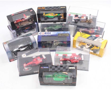 Twelve various mostly plastic cased 1/43 scale F1 racing diecasts to include; Hot Wheels Williams F1 Team, Burago Mercedes W0