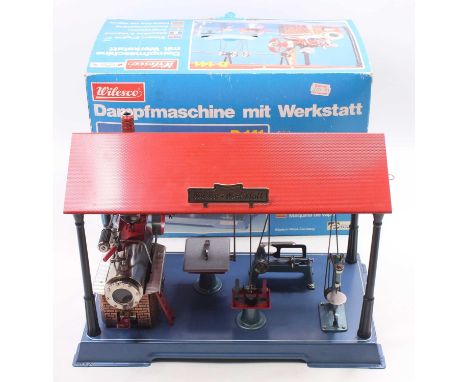 A Wilesco D-141 Work Station (Workshop), comprising boiler with tablet burner, lineshaft driving bench saw, grinder, reciproc