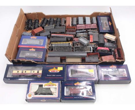 One tray containing various commercially built and kit built 00 gauge wagons to include a Bachmann BR Mk1 full brake in crims