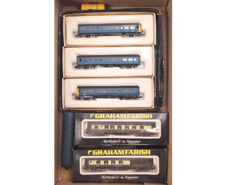 A small collection of N gauge to include a Graham Farish Class 101 in BR blue, yellow ends, a Lima class 31 in BR blue, two G