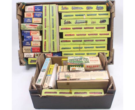 Two trays containing Kitmaster 00 gauge plastic kits, to include a BR Mogul, a BR corridor 2nd, a Stirling single, a City of 