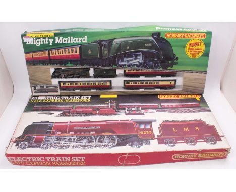 Two Hornby 00 gauge train sets to include an LMS Express Passenger set comprising a Duchess Class loco in LMS maroon livery, 