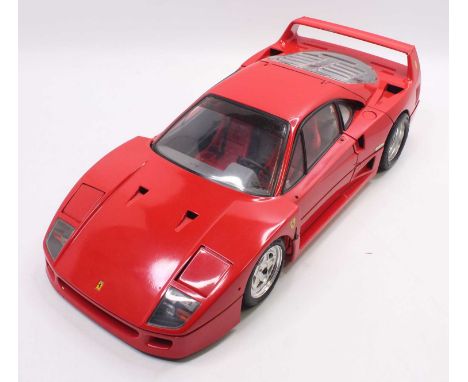 Pocher 1/8 scale kit built model of a No.57 Ferrari F40 in red body with red interior, loose example   chips to the paint all