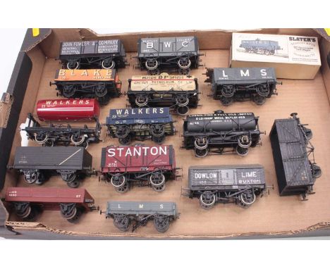 One tray containing 14 kit-built 0 gauge finescale wagons to include a Slaters square tar wagon, a converted Lima five plank 