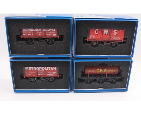 Five Dapol 0 gauge wagons to include a 7 plank private owner wagon, in CWS red livery, a limited edition 5 plank private owne