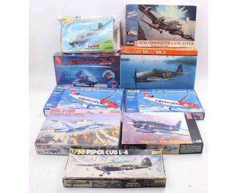 One tray containing nine various plastic aircraft kits to include a 1/48 scale Hellcat by Eduard, an Academy Model Kits MIG21