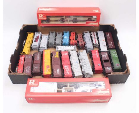 One tray containing various HO gauge wagons to include two boxed Rivarossi log car sets, each set comprising two cars and loa