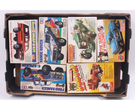 Revell/Airfix and other 1/32 scale group of 6 mostly racing plastic kits to include; The Dukes of Hazard Cooters Cruiser, Ast