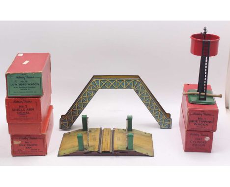 A small collection of Hornby 0 gauge to include an unboxed level crossing, an LMS open wagon, housed in an incorrect box, a n