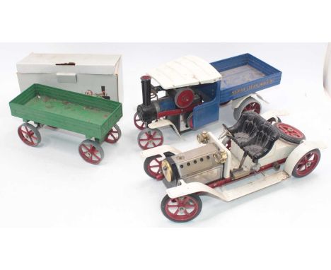 Three Mamod items to include a SW1 steam wagon, in blue, missing the burner, and drivebelt, used example, would benefit from 