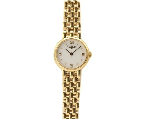 A ladies' 18ct gold Longines 'Prestige' quartz bracelet watch,19mm diameter, with a white dial, gilt hour markers and Roman n