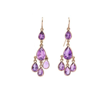 A pair of gold and amethyst drop earrings,a pear mixed cut amethyst drop to the centre, with three suspended pear mixed cut a