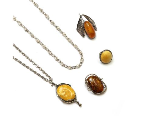 A collection of silver and amber jewellery,to include a silver and clarified amber stylised insect brooch, with an oval amber