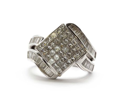 A white gold multi stone diamond ring,the centre offset square panel with rows of invisible set princess cut diamonds, to cro