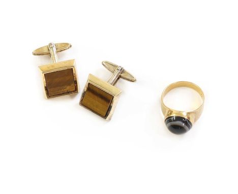 A pair of gold plated tiger's eye Dunhill cufflinks,in 'A touch of glass, 1 Church St Yeovil' case, marked Dunhill GP, and a 