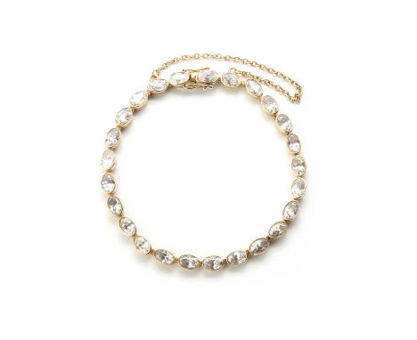 A 9ct gold cubic zirconia line bracelet,with oval cut cubic zirconia, rub set to articulated plain collets, to a box clasp an