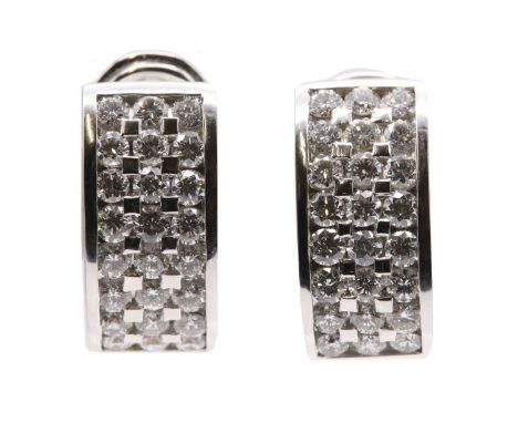 A pair of 18ct white gold diamond set cuff earrings, by Picciotti, c.2002,each flat section slightly curved cuff, 9.1mm wide,