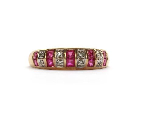 A 9ct gold ruby and diamond ring,a series of two channel set square rubies, alternating to a series of two grain set eight cu