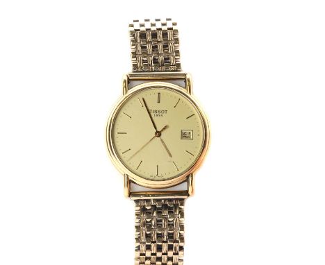 A gentlemen's 18ct gold Tissot quartz bracelet watch, 33.5mm diameter, with a champagne dial, baton hour markers and date ape