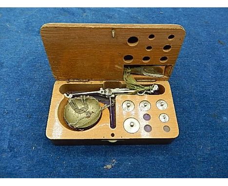 Hand balance scales boxed with 5 weights