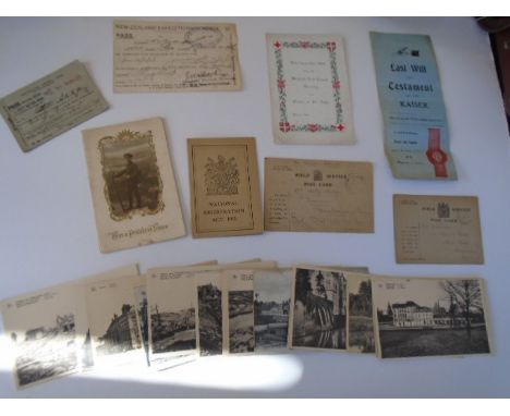 A collection of World War I ephemera to include  25 French post cards - depicting French towns pre and post war. 2 field serv