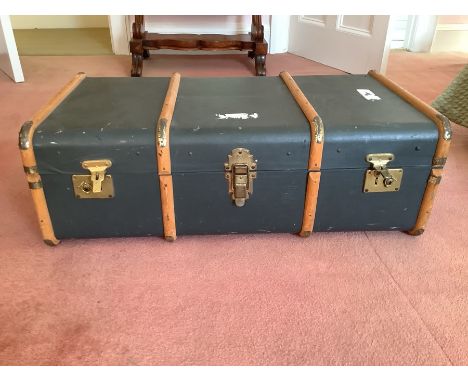 Banded trunk, colour green with brass fittings and internal tray. Size: L 36" H 11 1/2" Width 19"