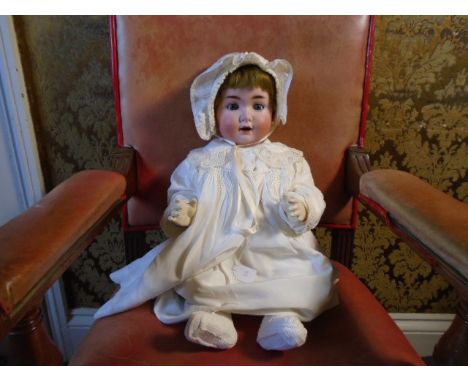 A vintage (Edwardian era) composite bisque faced doll. marked 'S and Q, 12' Germany - Schutzmeister and Quendt,  Articulated 