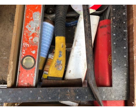 Assorted tools including axe