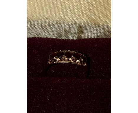 9ct Dress Ring with 5 red garnets 1.76 grams 