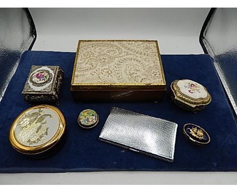 collection of trinket boxes and pill pots