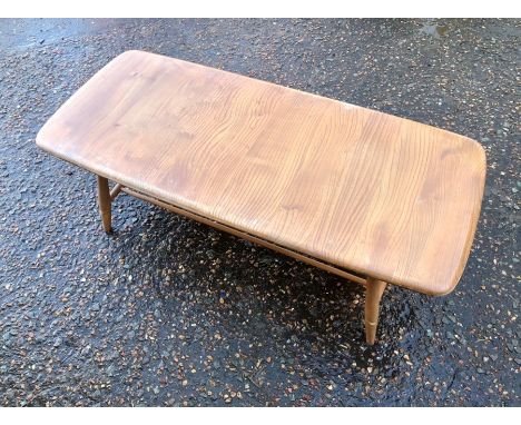 Ercol rectangular coffee table with magazine shelf below 