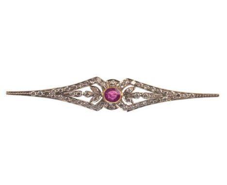   Brosche im Art Deco Stil, 750er GG/WG, Brillanten 0,64 ct., 1 Rubin 0,38 ct., Länge  ca.  5,5 cm, Gew. 4,6 g          