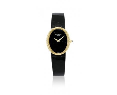 OROLOGIO DA DONNA PATEK PHILIPPE ELLIPSE REF. 4310, ANNI ’80 Cassa ovale a due corpi in oro 18k con brillantini incastonati, 