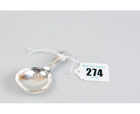 A caddy spoon - a silver caddy spoon with circular plain bowl and shaped and curved handle, 0.2 ozs, London 1794 by Thomas Mo