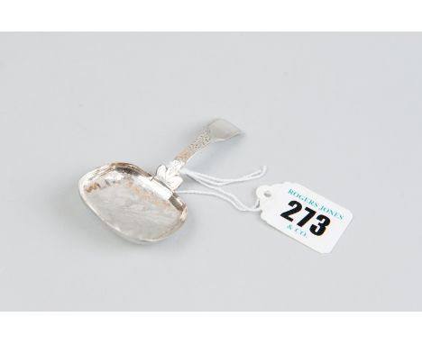 A caddy spoon - a Georgian silver caddy spoon, the bowl with leaf decoration and having a curved fiddle patterned handle, 0.2