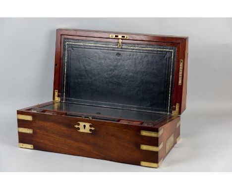 A good quality early 19th Century mahogany and brass bound campaign writing slope, the brass nameplate marked 'W F Baker', st