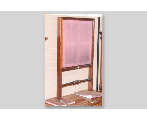 An early Victorian extending mahogany firescreen, twin slide-out panels with turned knobs and plain fabric panels, straight s