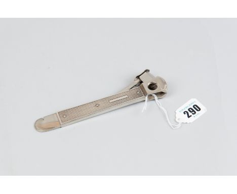 A cigar cutter - an engine turned silver cigar cutter, 3.3 ozs gross, Birmingham 1956 with a cutting mechanism by Solingen
