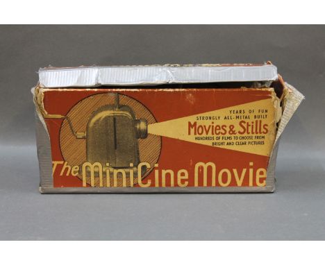 A Mini Cine movie projector 