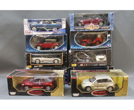 A group of 10 boxed large scale diecast model vehicles by makes including Maisto, Premier Collection and Solido 