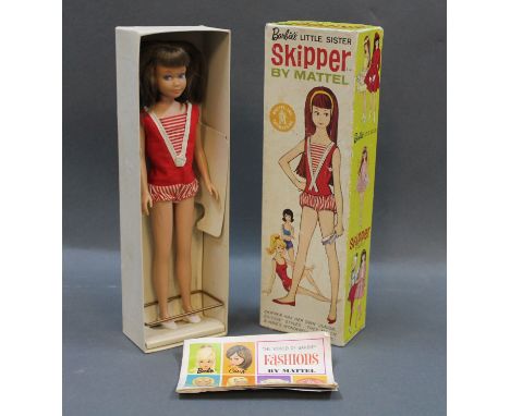 A boxed Mattel "Skipper" doll, 1963. Complete with stand and catalogue 