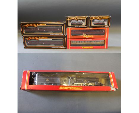 A group of 7 boxed Hornby and Mainline railways 00 gauge scale models of locomotive, coaches and rolling stock including R860