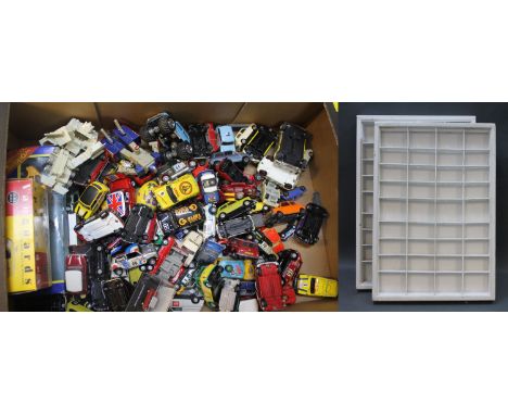 A display case of die cast model minis and other cars, from makes including Corgi & Hongwell, together with another display c
