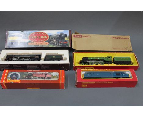 A group of Triang and Hornby 00 gauge model locomotives consisting of limited edition BR Britannia Class Robert Burns locomot