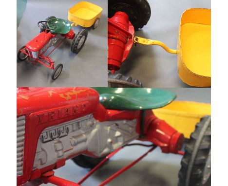 A metal Tri-ang child's pedal tractor with trailer & connecting pin 